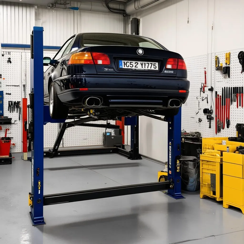 Car on a lift in a garage