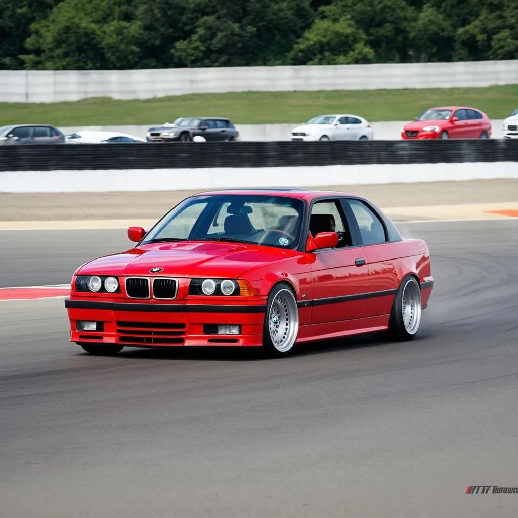 BMW E36 with a roll cage on a racetrack