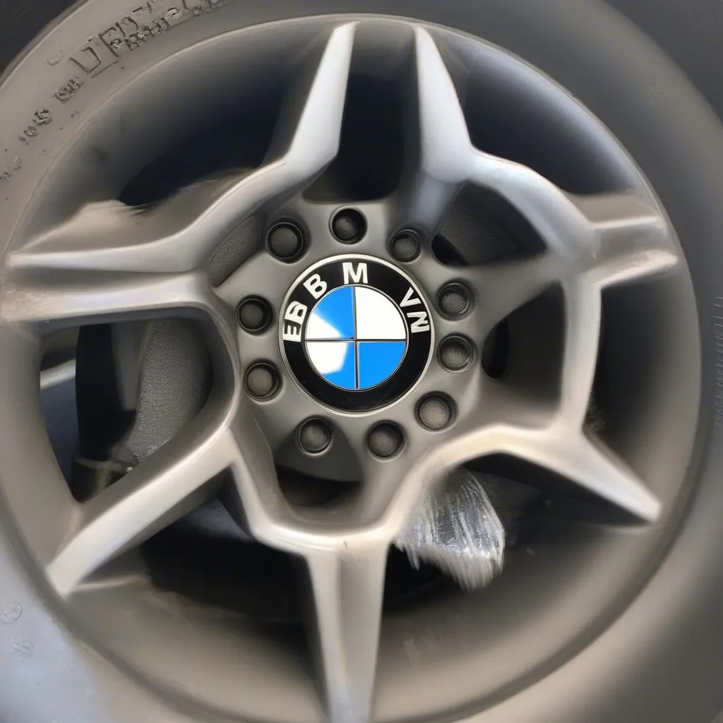 Curb rash on 2011 BMW 328i xDrive alloy wheels