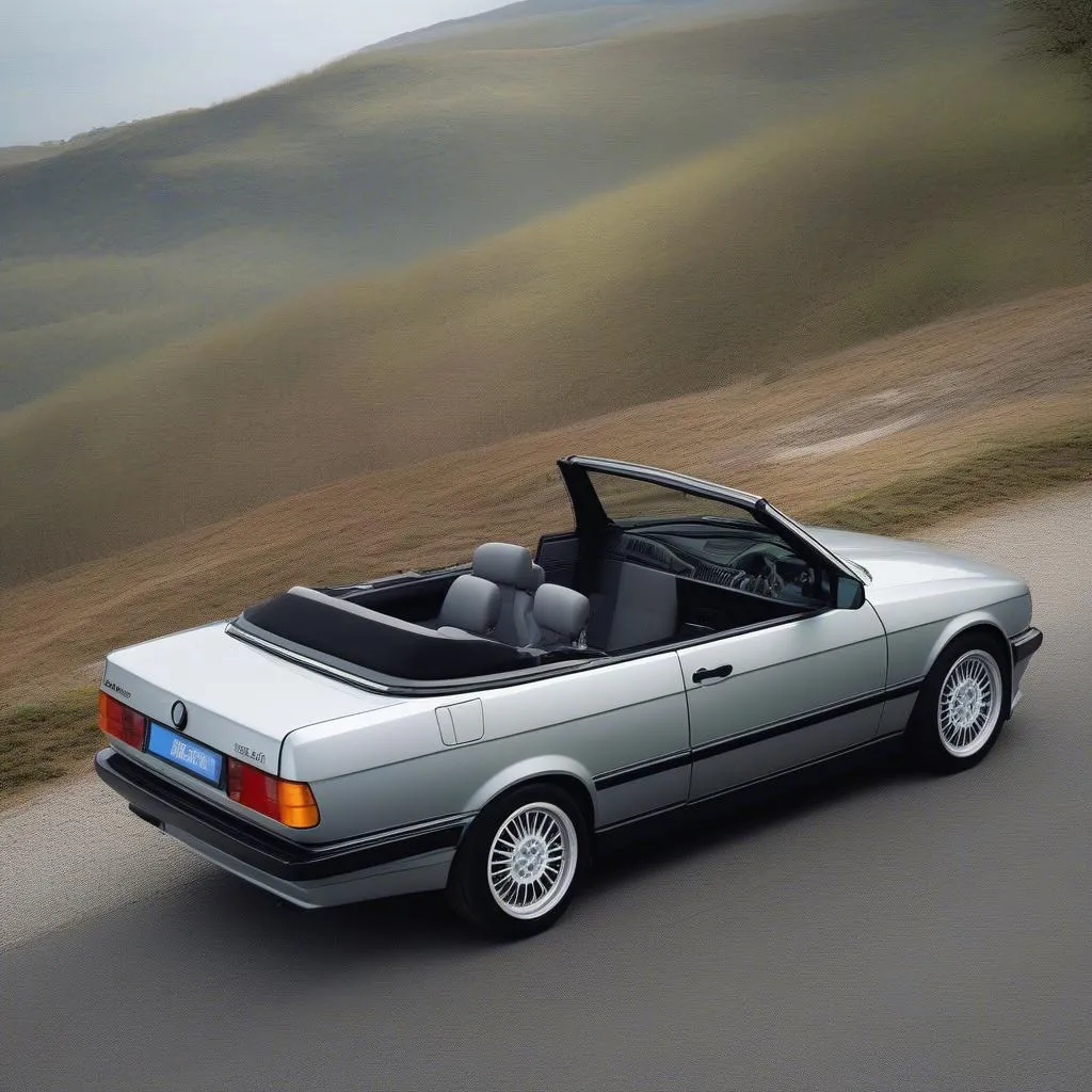 BMW E30 Baur Convertible Roof: A unique feature of the E30 Baur, featuring a steel and fiberglass roof that can be easily removed and stored in the trunk.