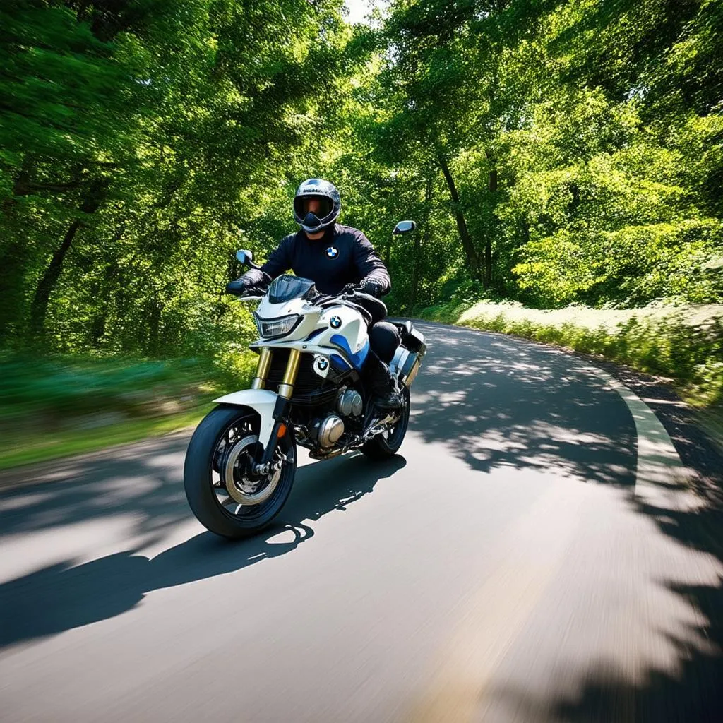 BMW R1150R Rockster riding on a winding road