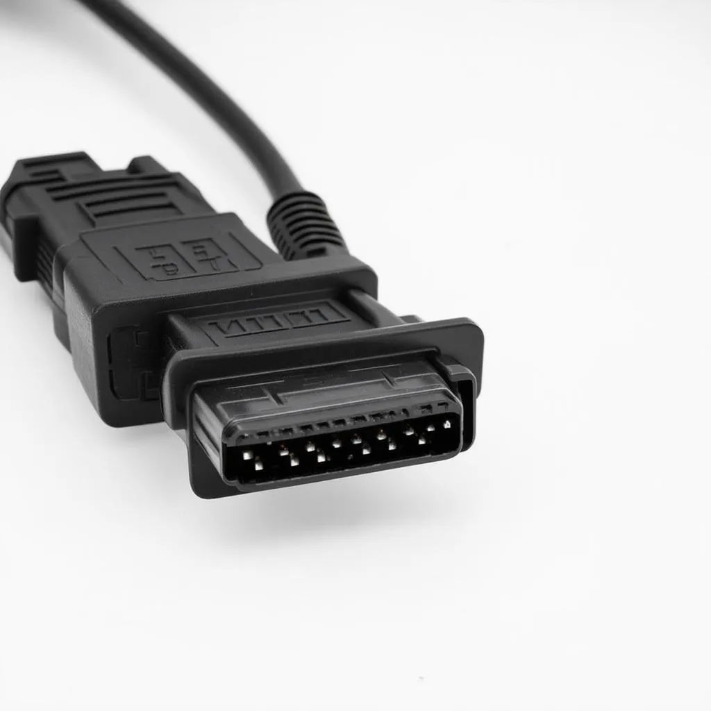 VCDS Cable Connected to OBD-II Port