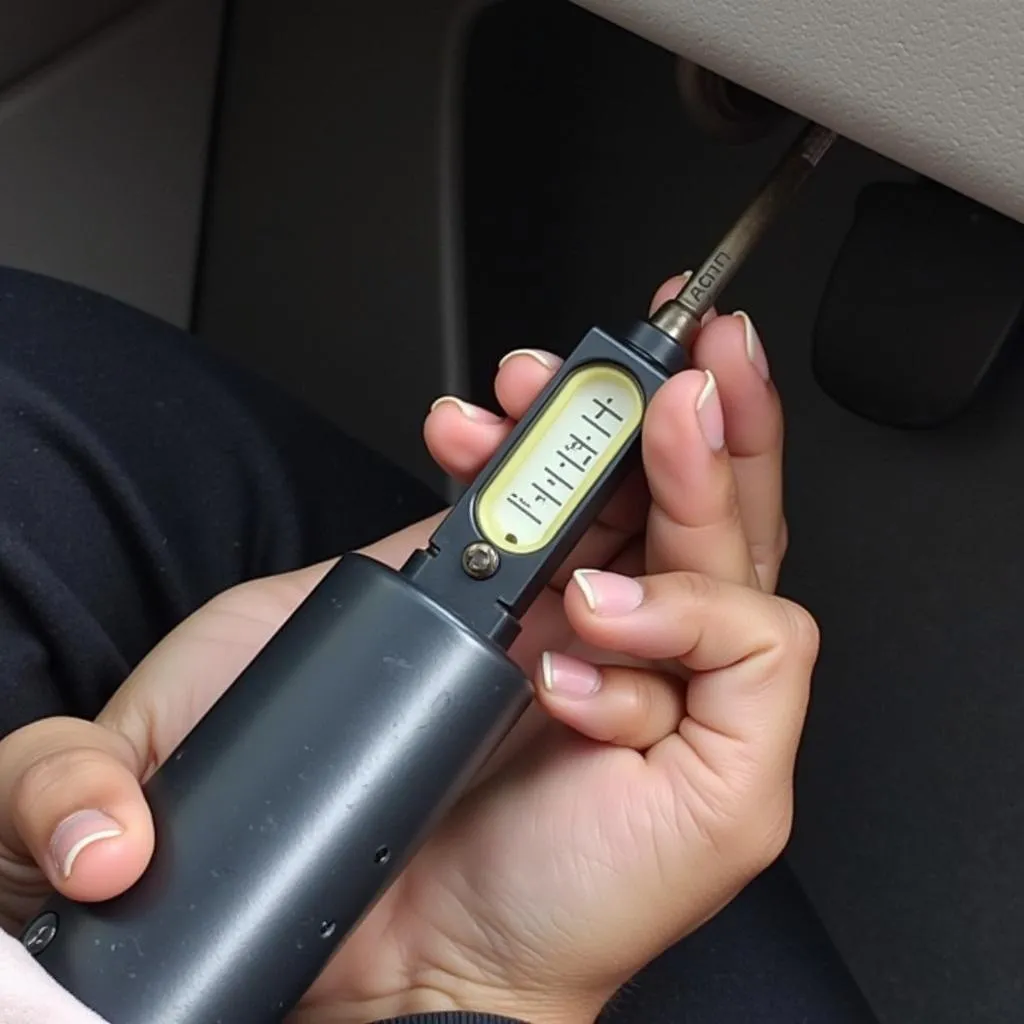 Checking the oil level on a 2004 BMW 325i using the dipstick