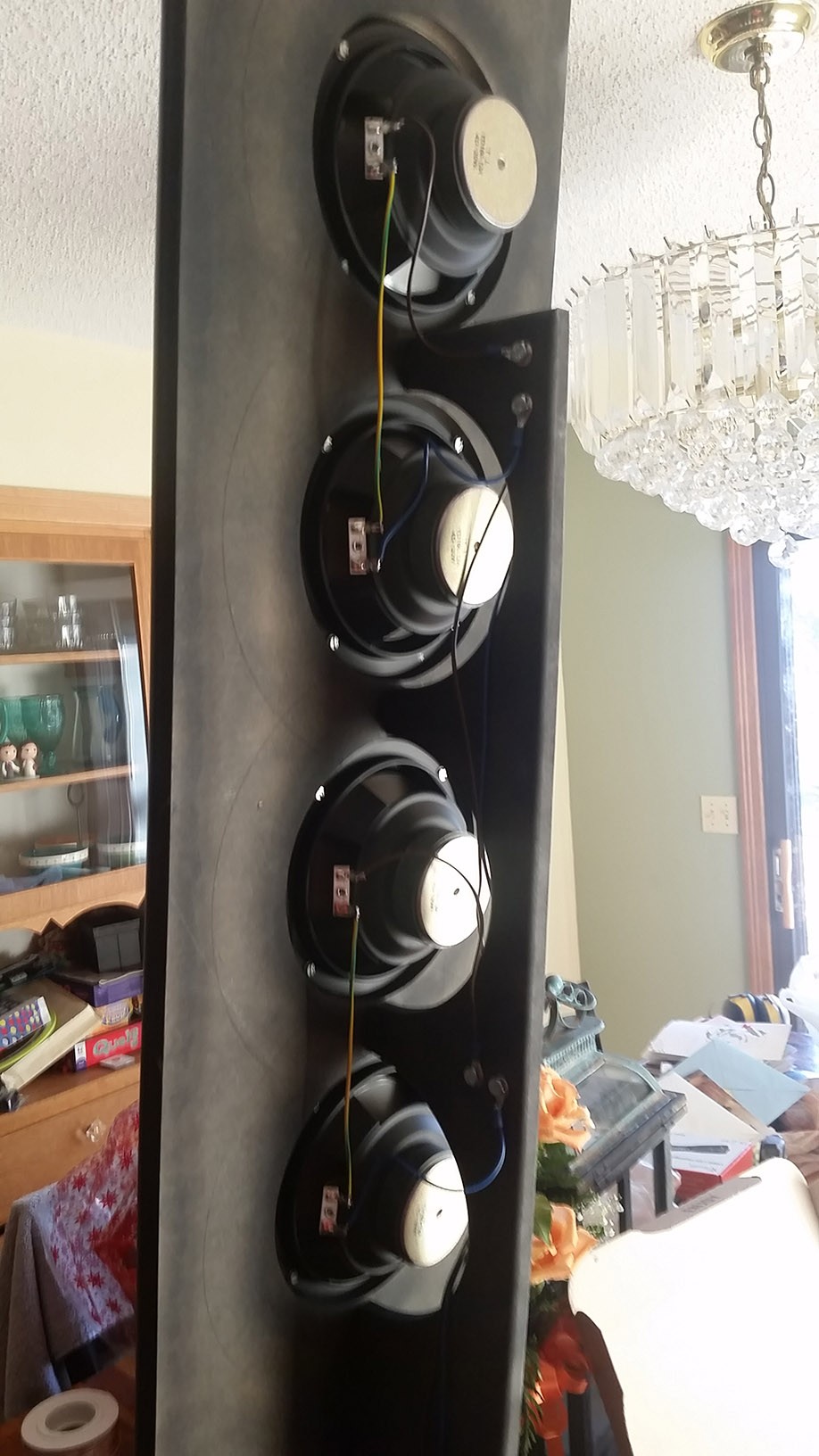 Rear view of the DIY open baffle tower speakers showing wiring and open back design.