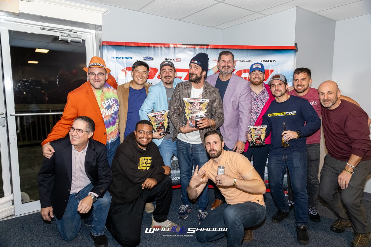 Spec Miata racers at an awards banquet, showcasing the community aspect of the sport.