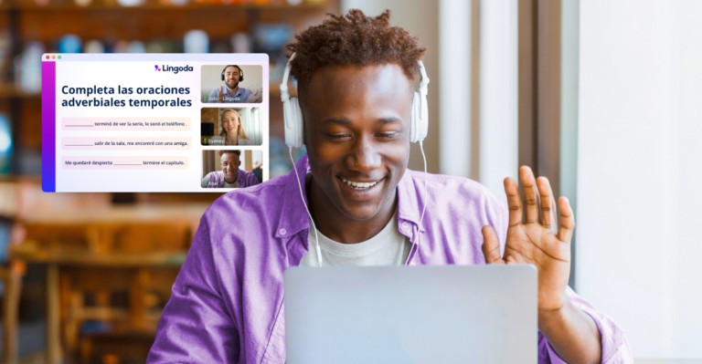 Man in front of his laptop taking an online class about Spanish adverbs