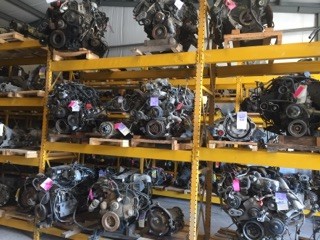 Inside Walt's Auto Inc. facility showcasing organized rows of car parts inventory for Springfield car parts customers.