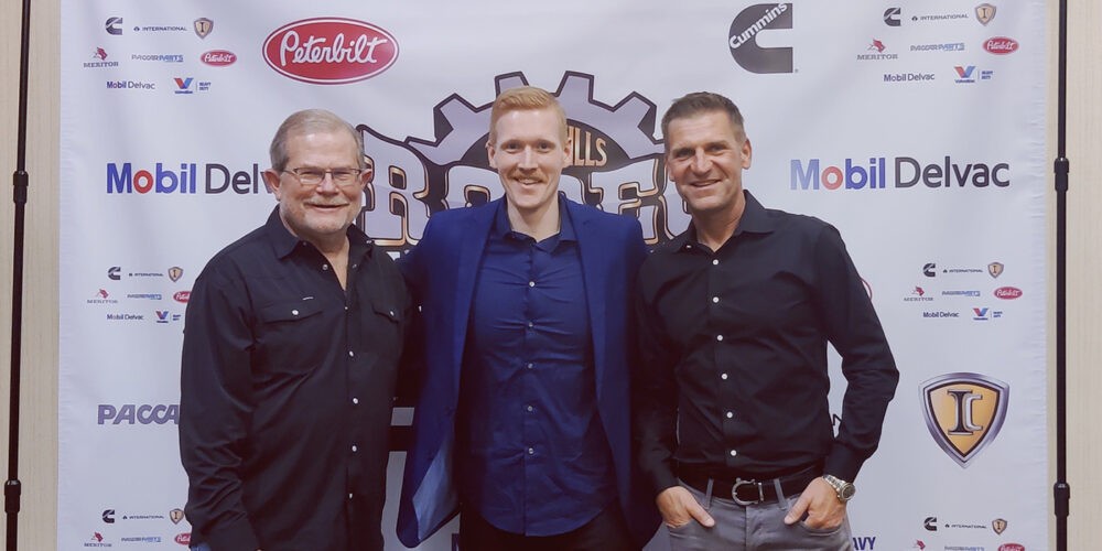 Rusty Rush, Kevin Linger, and Clint Bowyer at the Rush Truck Centers Tech Skills Rodeo, an event showcasing automotive expertise and quality car parts.