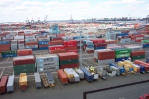 Shipping containers symbolizing global trade and automotive parts imports