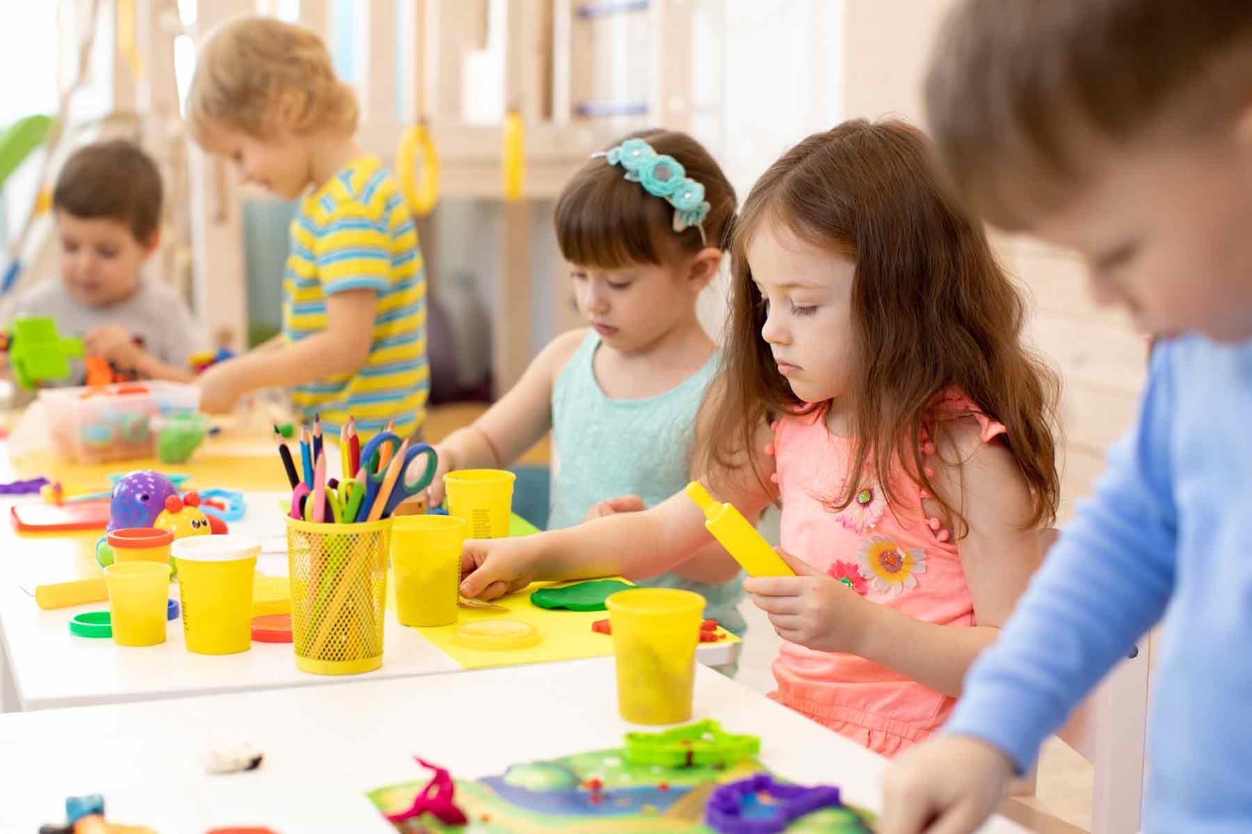 Children doing arts and crafts in daycare