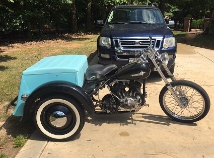 Vintage Harley Davidson Servi-car undergoing restoration